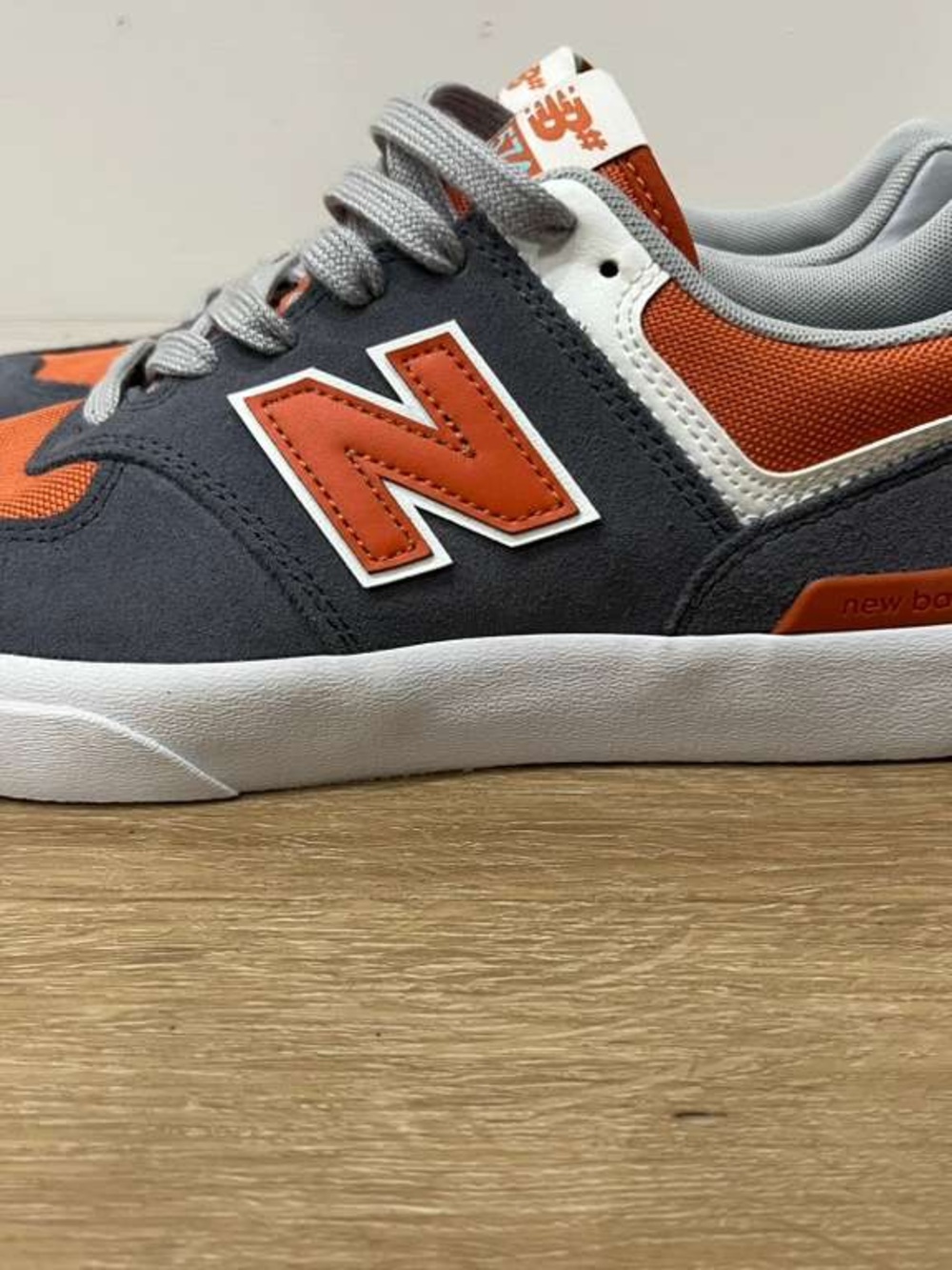 New Balance Gray and Orange Athletic Sneakers
